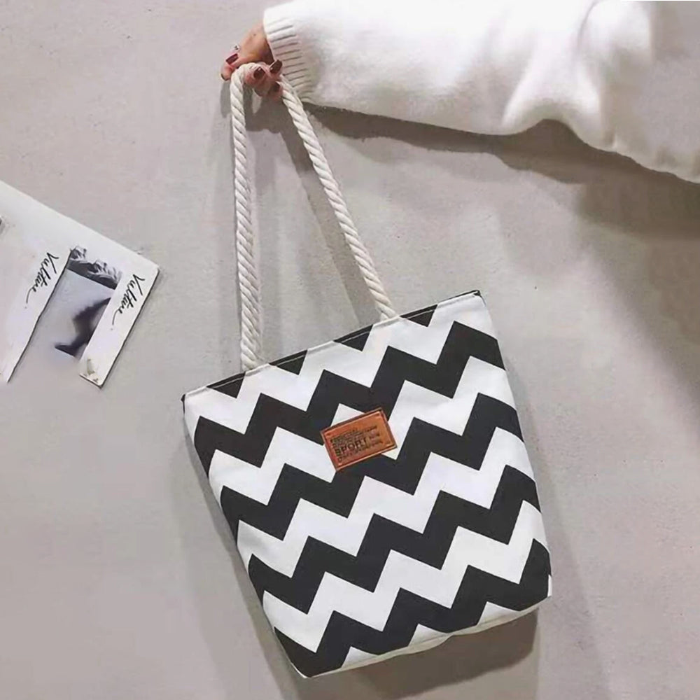 Dollcini Női Kézitáska – Vízálló és Könnyű Műbőr, Fekete-Fehér