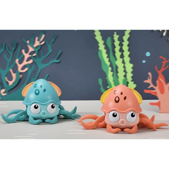 Dollcini Zenélő Mászó Polip Játék – LED Fényekkel, USB-s