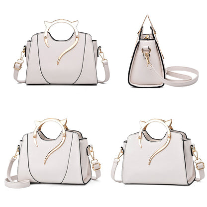 Dollcini Outlet Női Kézitáska – Elegáns, Cicás Fogantyúval, Szépséghibás termék