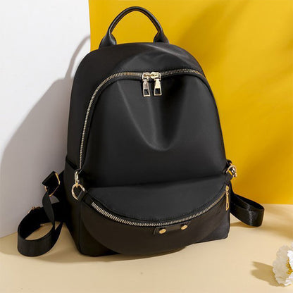 Dollcini Stílusos Női Hátizsák – Vízálló, Elegáns és Praktikus